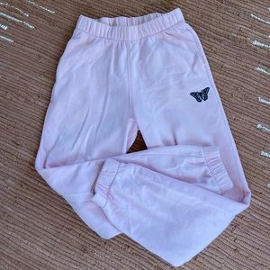 COMFY AND CUTE SWEATS WITH A BUTTERFLY ON THEM